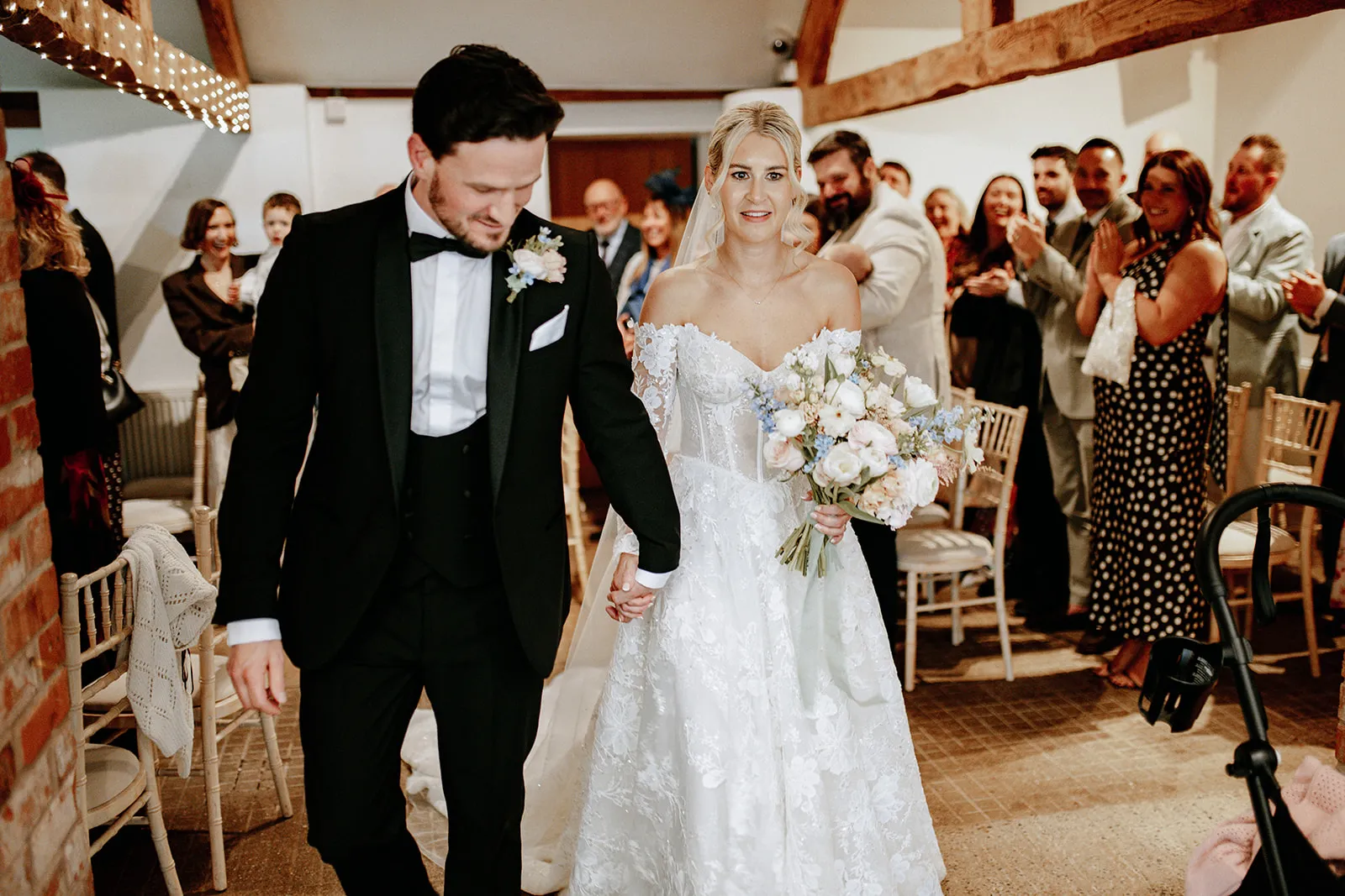 Quantock Lakes Wedding Venue confetti exit laughing