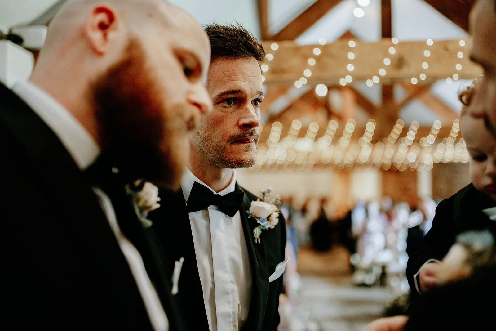 Quantock Lakes Wedding Venue groomsmen emotional exchange