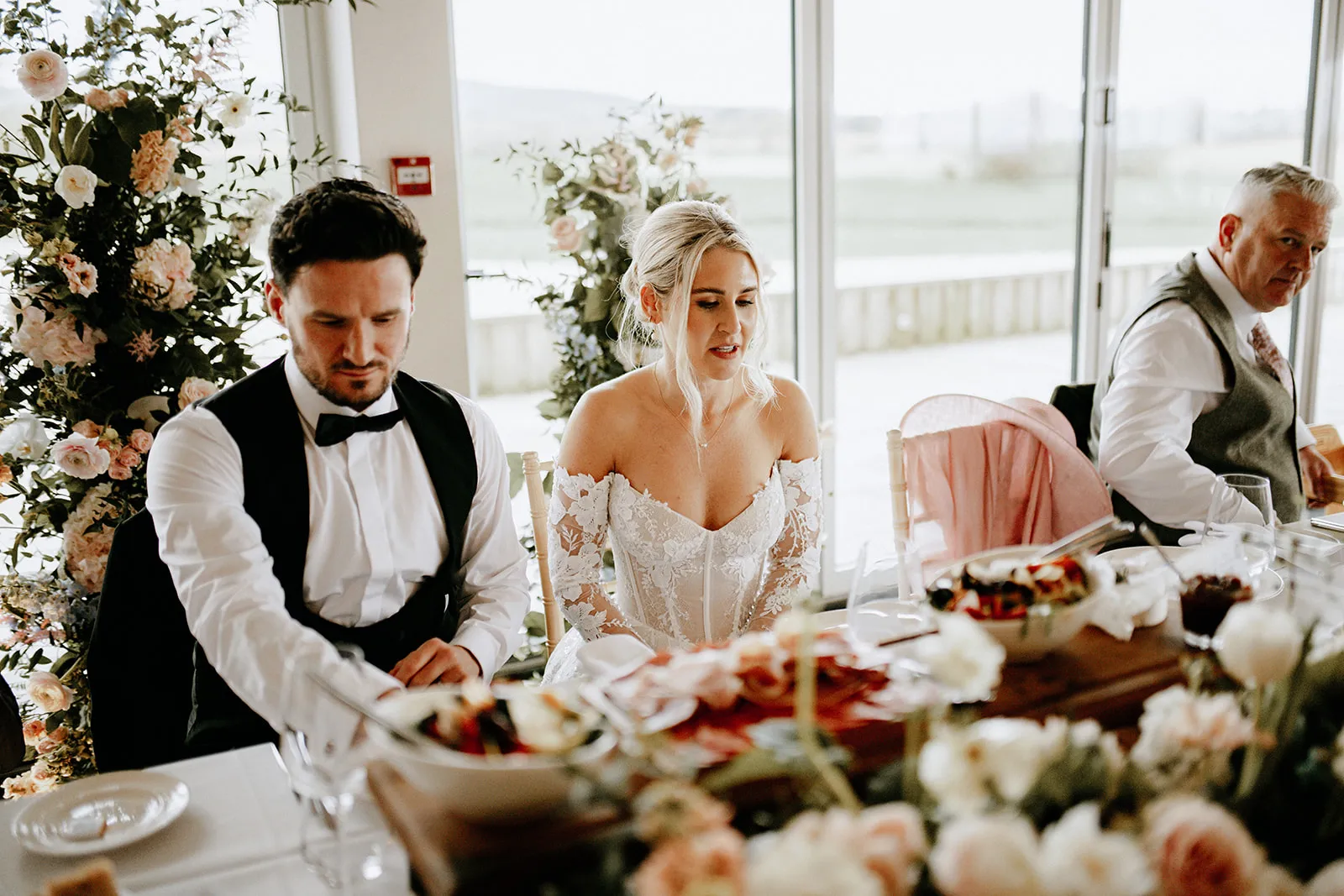 Quantock Lakes Wedding Venue bride groom seated