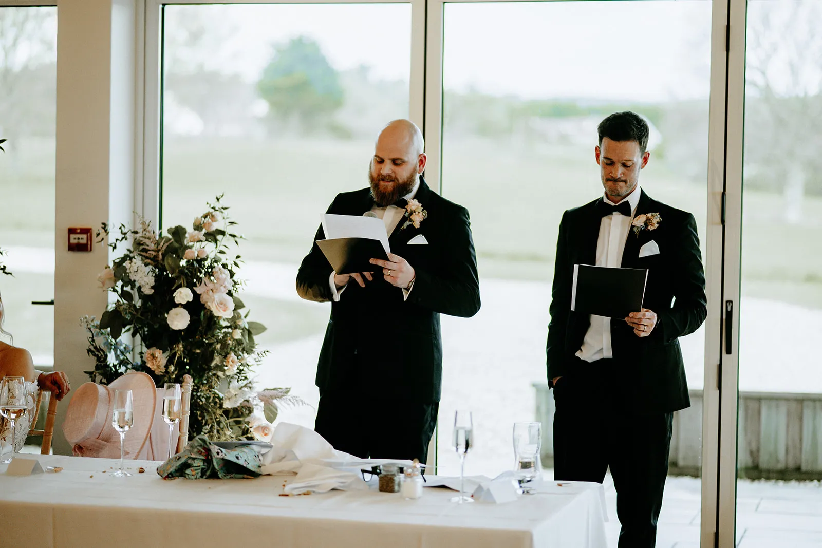 Quantock Lakes Wedding Venue two speakers at table