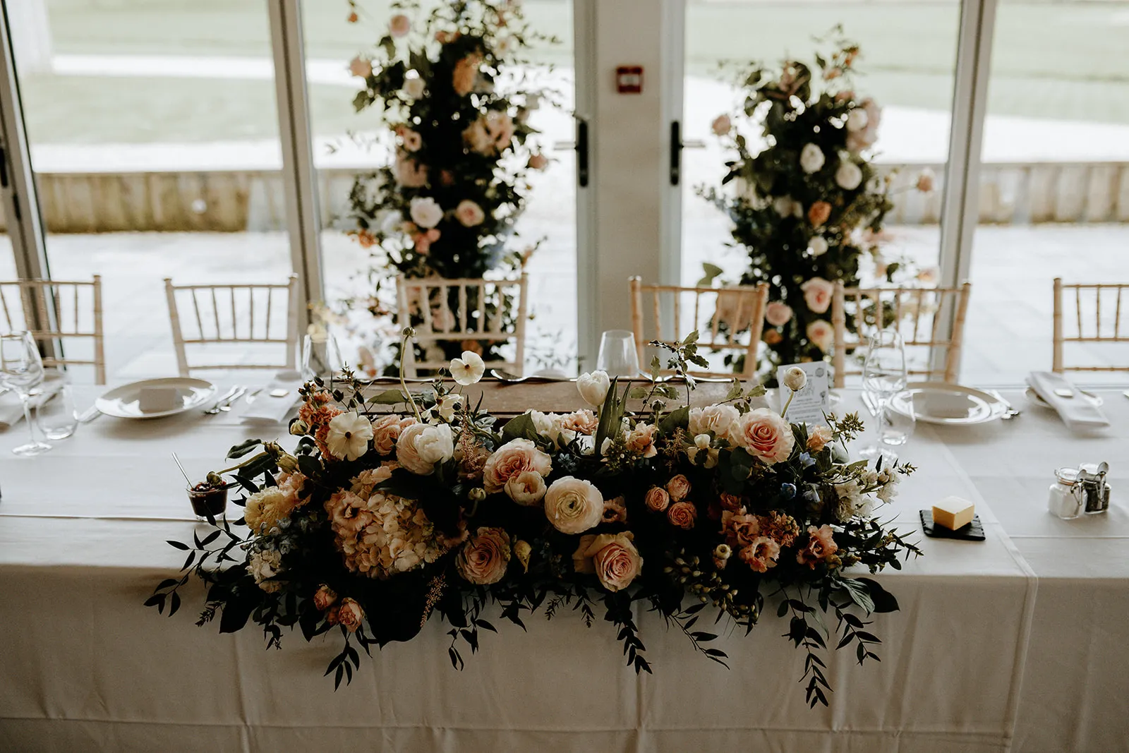 Quantock Lakes Wedding Venue floral table arrangement